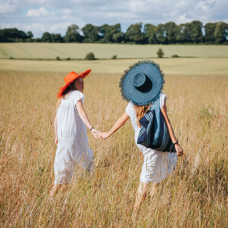 Artisan Woven Wide Brim Hat With Fringe